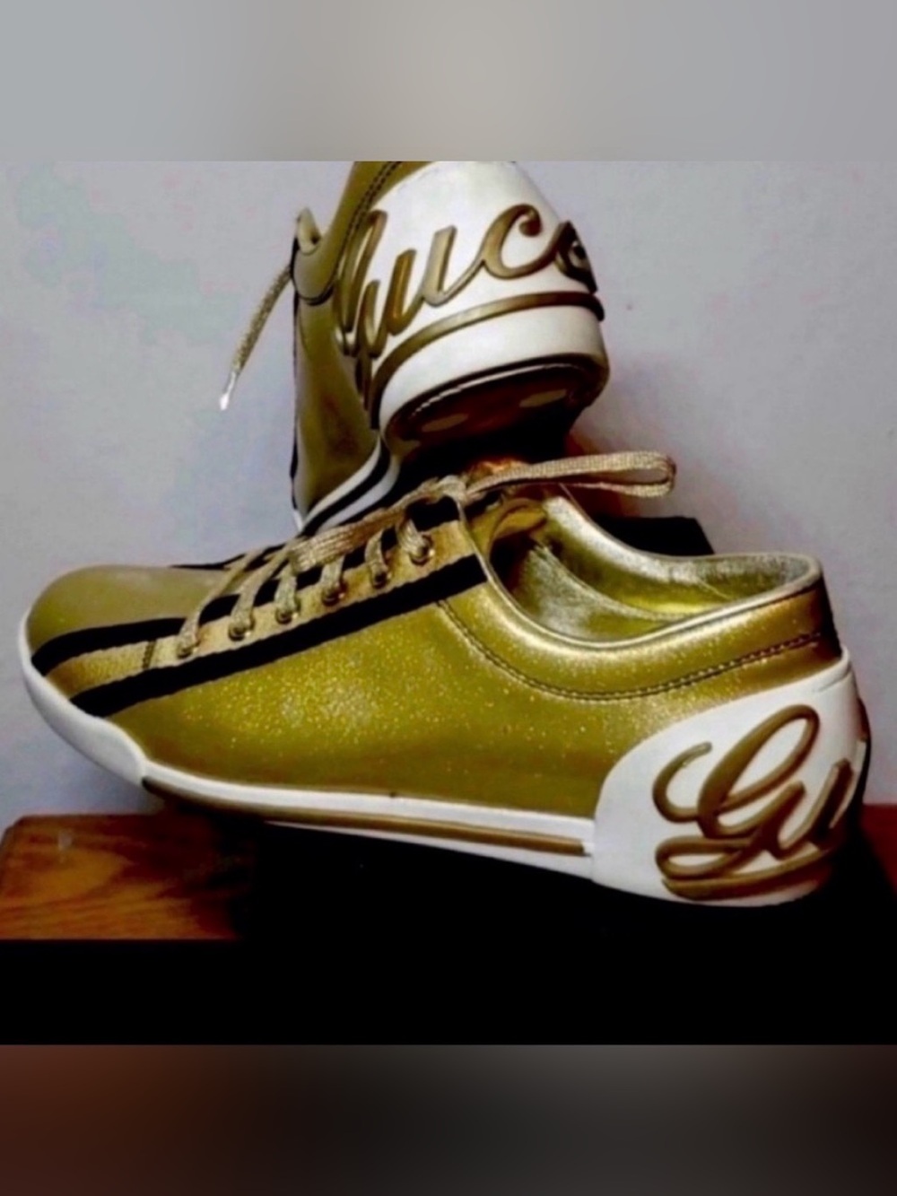 Authentic Gucci Metallic Gold and Black Low-Top Sneakers - size 38